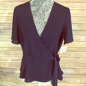 Navy blue peplum wrap top